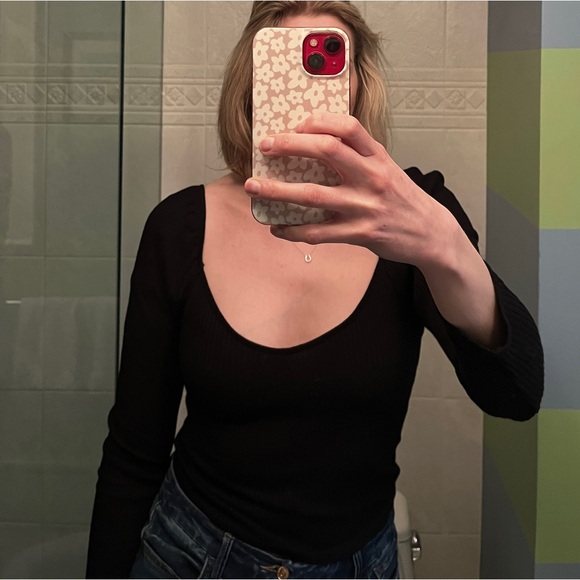 Black puff sleeve, long sleeve top. Stretchy ribbed material. - Picture 1 of 3